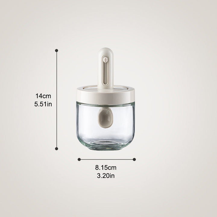 Versatile glass seasoning dispenser bottle with spoon attachment for all cooking needs
