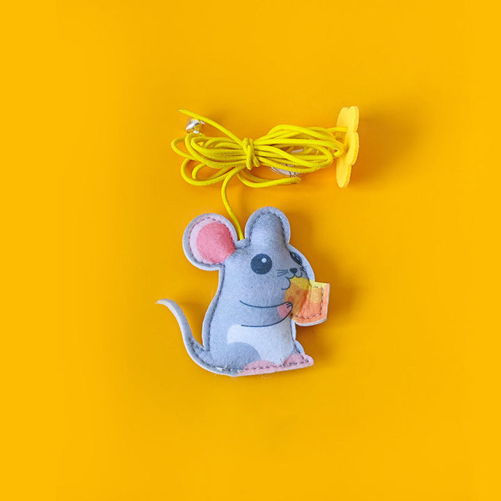 Child and cat playing together with the hanging interactive cat toy, showing it's safe for home use