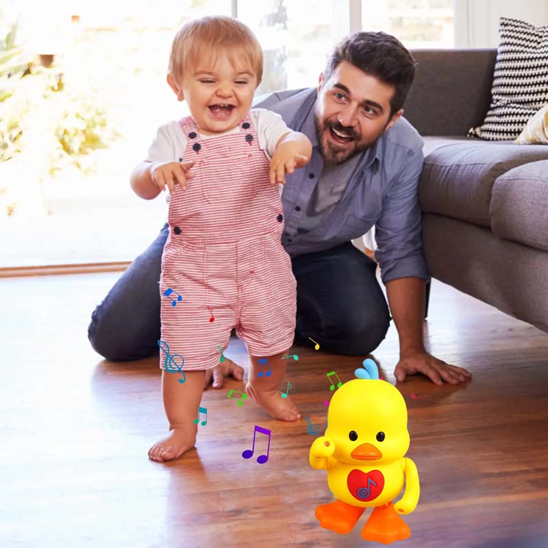 Details of the musical duck toy's base, showing controls and speaker.