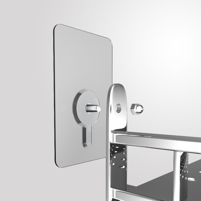 Close-up of a transparent adhesive hook, showcasing strong no-drill wall hanger technology