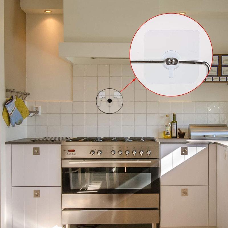 Transparent adhesive hook supporting a light item, emphasizing its damage-free wall hanger capability