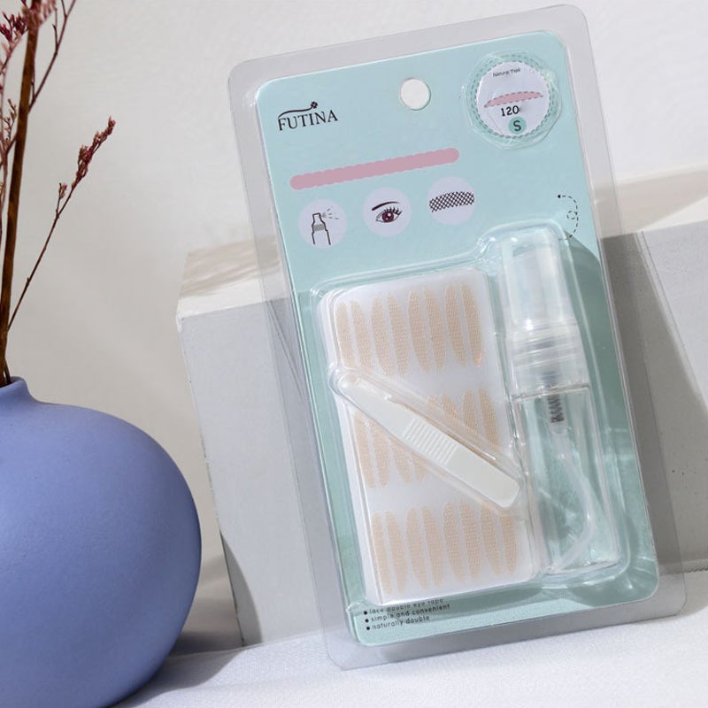 Hand holding a sheet of invisible eyelid tapes, a convenient beauty tool for eye lift.