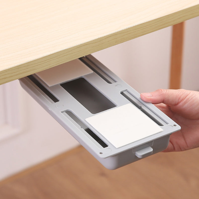 Invisible desk organizer, side view, showing discreet pull-out design for hidden storage.