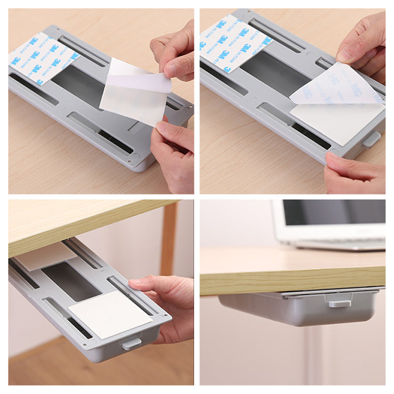 Hands pulling out an invisible under desk storage drawer, revealing organized office supplies.