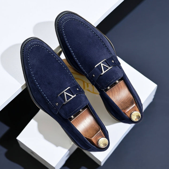 Classic men's slip-on loafers, perfect for formal events or business casual. Comfortable, timeless Italian design.