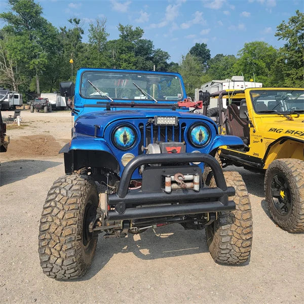 Installation process of Beast Eyes headlight decal on a Jeep headlight; DIY auto accessory
