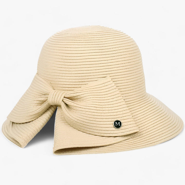 Stylish Panama straw wide brim sun hat for women in khaki, ideal for beach, travel, and summer.
