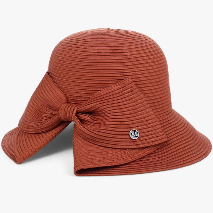 Women's khaki wide brim sun hat, offering excellent UV protection for beach days & summer adventures.