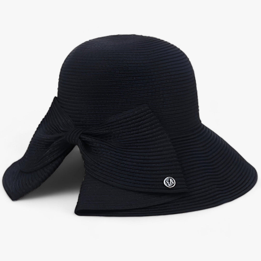Chic khaki Panama straw wide brim sun hat for women, essential summer accessory with UV protection.