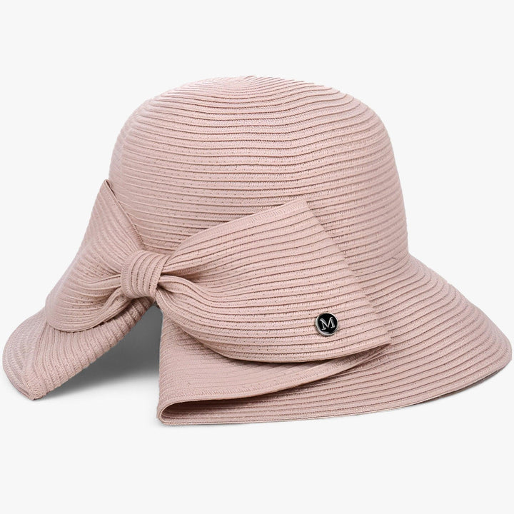 Women's wide brim khaki sun hat made of Panama straw, offering UV protection for summer activities.
