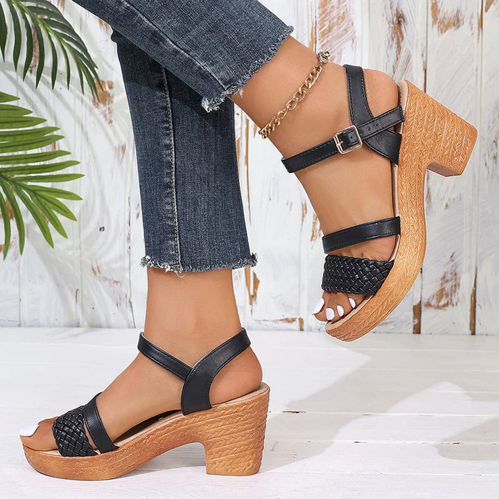 Detail of the woven straps on khaki block heel sandals for women