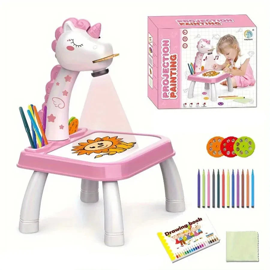Child drawing on Artella interactive projection table. Green educational toy for creative art & toddler activity.