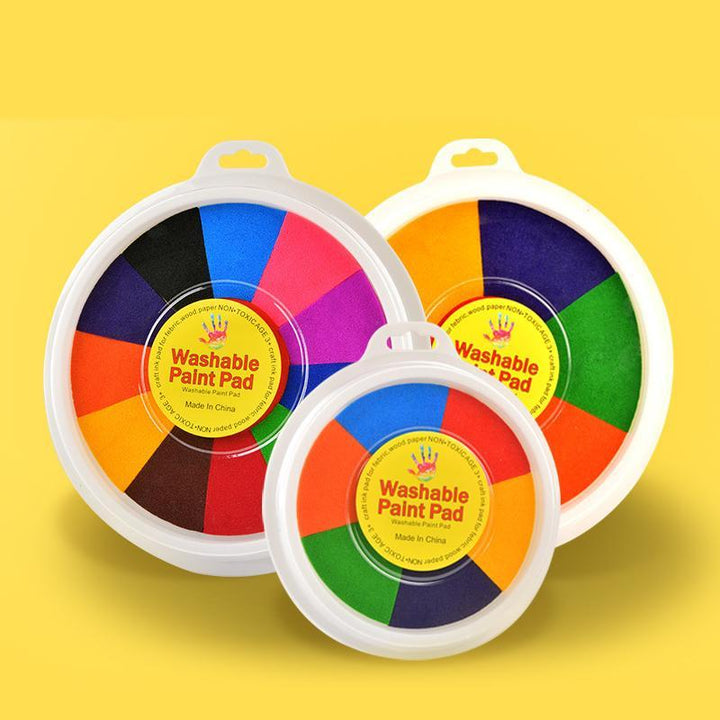 Vibrant red finger paint on paper, part of the Kids' Creative Finger Painting Art Kit & Book
