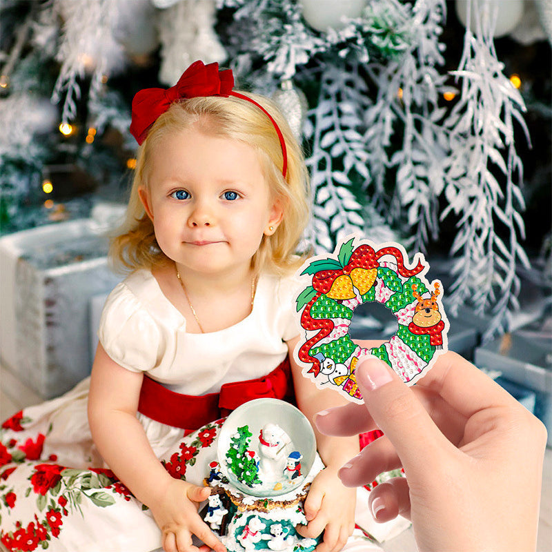 Close-up of kids' hands meticulously placing mini diamonds on a holographic suncatcher sticker from art kit