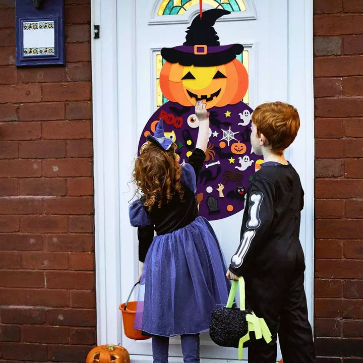 A finished felt Halloween pumpkin witch decoration, handcrafted by a child, suitable for garden decor
