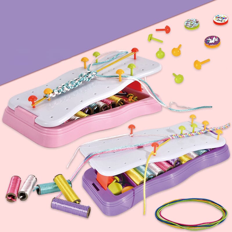 Group of children happily making friendship bracelets together using their DIY craft kits