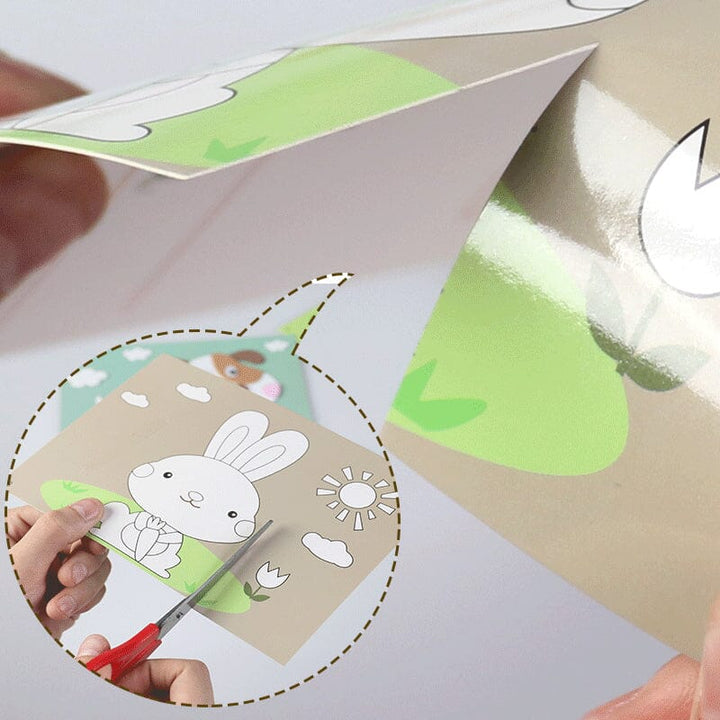 Detail of a lion foam sticker being applied, showcasing the 'animal craft' aspect of the DIY kit.