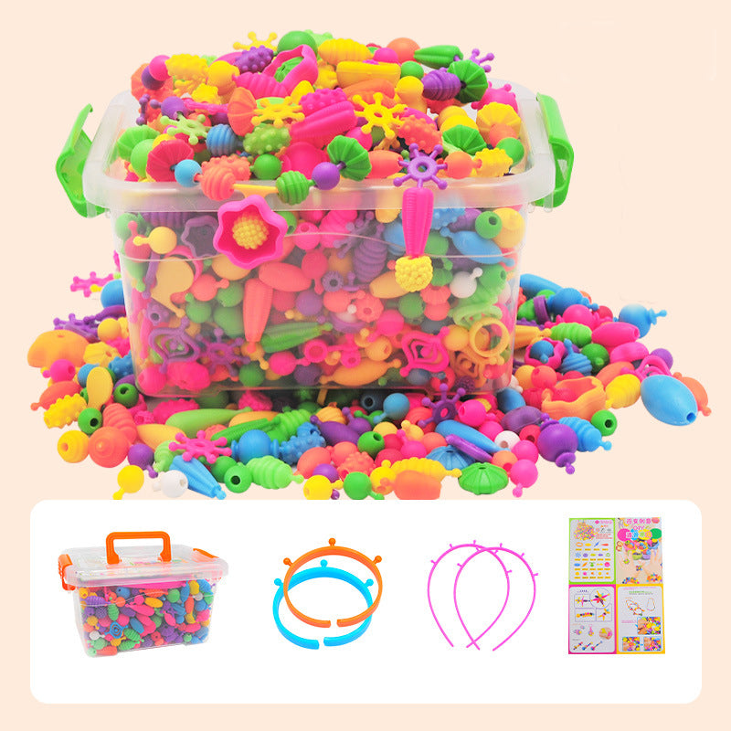 A pile of colorful pop beads from the DIY Jewelry Making Kit, ready to be transformed into unique accessories
