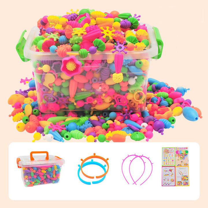 A pile of colorful pop beads from the DIY Jewelry Making Kit, ready to be transformed into unique accessories