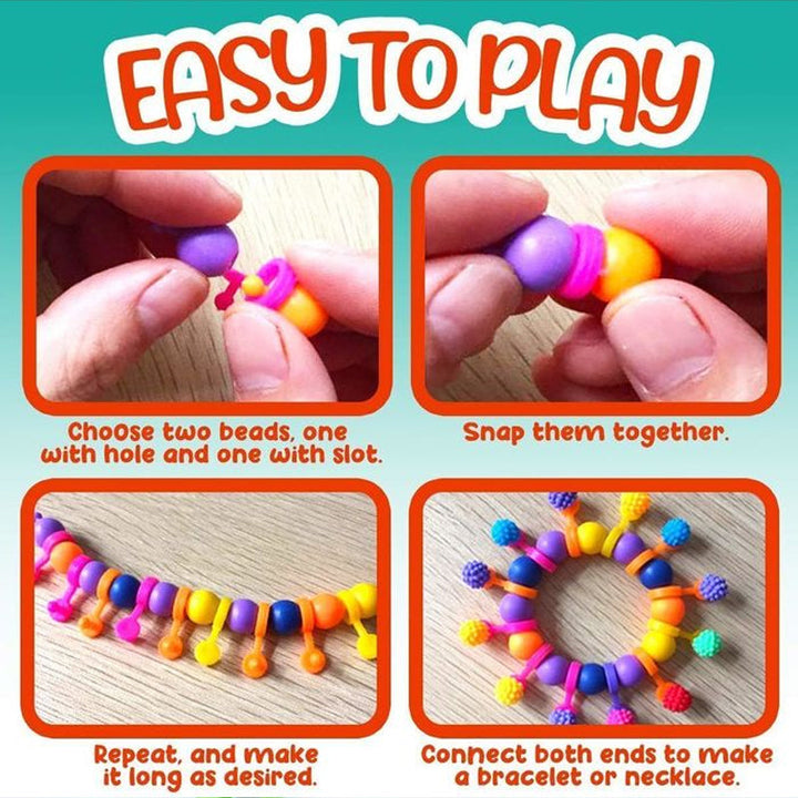 Smiling girl proudly displaying a handmade pop bead necklace, enjoying her DIY jewelry making kit for creative play