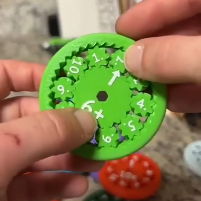 Child smiling, actively engaged with a Math Fidget Spinner, learning aid