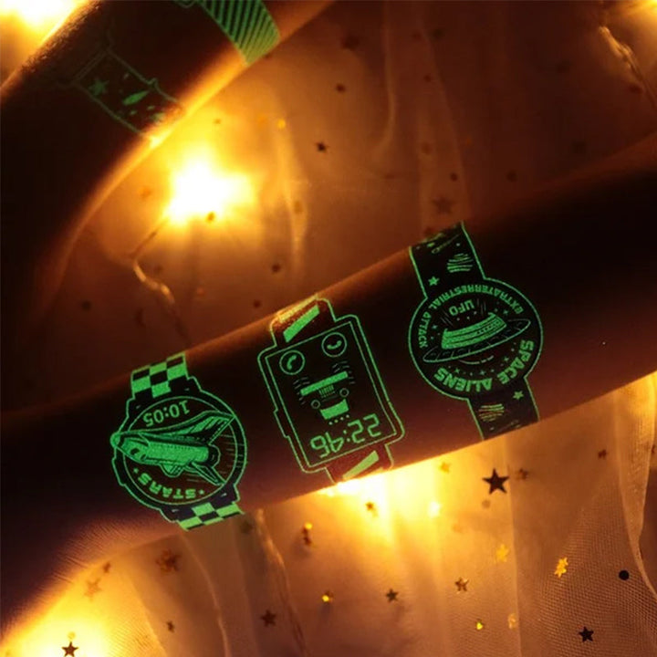 Sheet of kids racing car themed luminous temporary watch tattoos, skin-safe glowing stickers.