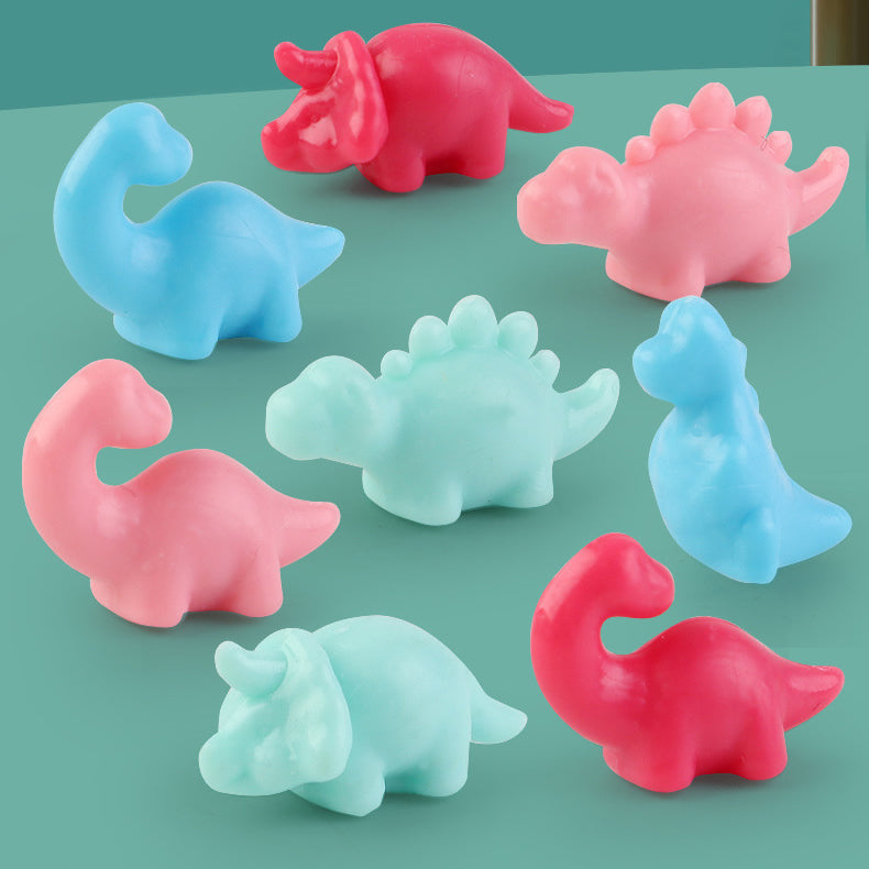 Hands-on fun with a Mini Dinosaur Claw Machine, a great children's toy for motor skills.