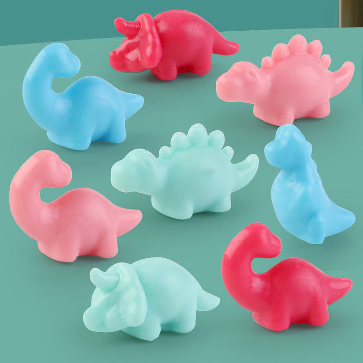 Hands-on fun with a Mini Dinosaur Claw Machine, a great children's toy for motor skills.