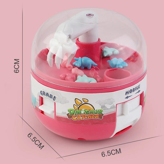Packaging for the Kids' Mini Dinosaur Claw Machine Play Set, ideal for gifting.