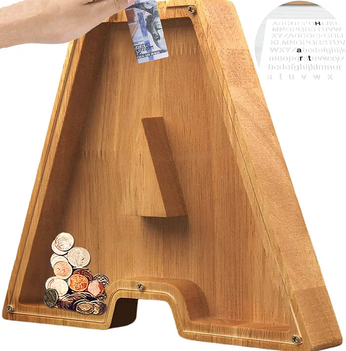 Smiling child interacting with a Personalized Wooden Alphabet Piggy Bank, learning through play