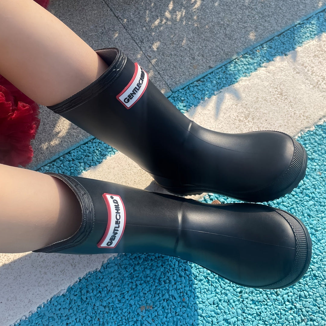 Stylish solid color waterproof kids' wellies, non-slip rain boots for boys & girls.