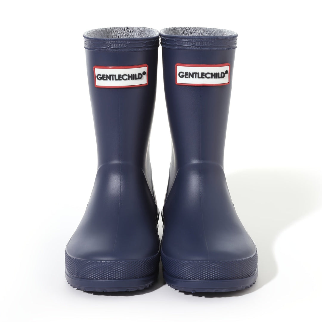 Solid color kids' waterproof rain boots for boys & girls, non-slip wellies for puddle jumping.