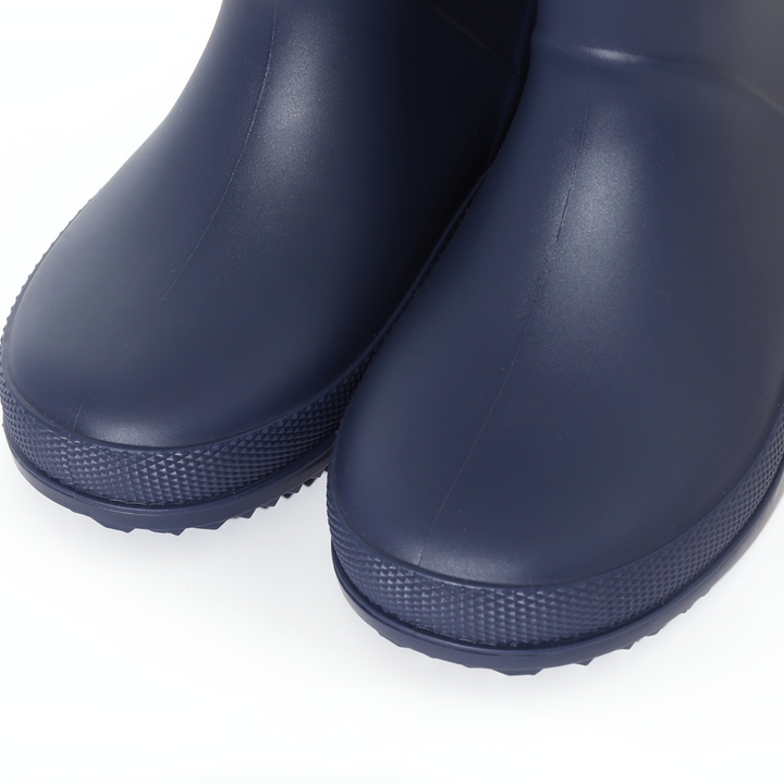Children's waterproof rain boots for boys & girls, non-slip wellies for muddy outdoor adventures.