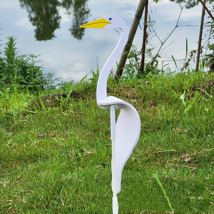 Flamingo garden wind spinner, a kinetic artwork that transforms your yard into a vibrant space