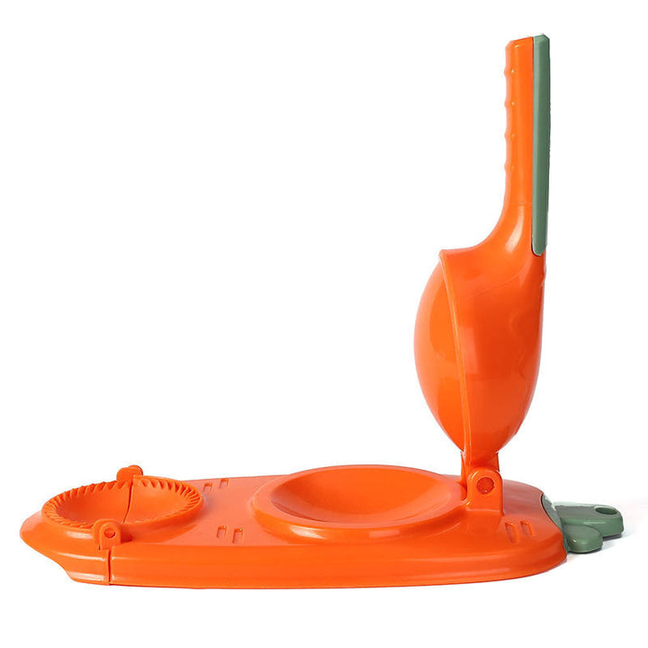 Kitchen gadget for food preparation: a 2-in-1 dumpling maker and dough press, front view
