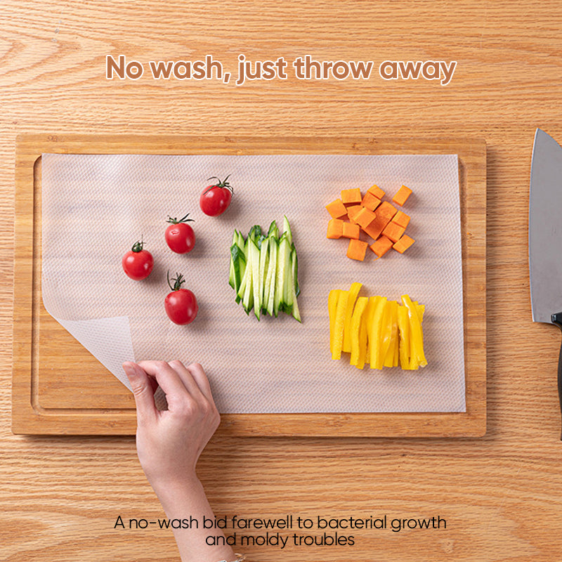 Person unwrapping a roll of disposable cutting board mat, ensuring hygienic cooking surface
