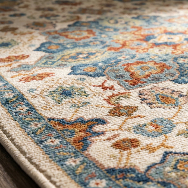 Statement outdoor rug, large and portable with flowing wave pattern. Easy to clean patio rug for modern garden decor.