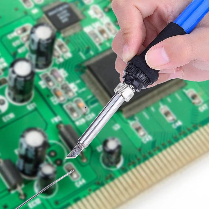 Lead-free solder wire melting onto an electronic circuit board, creating a secure electrical connection.