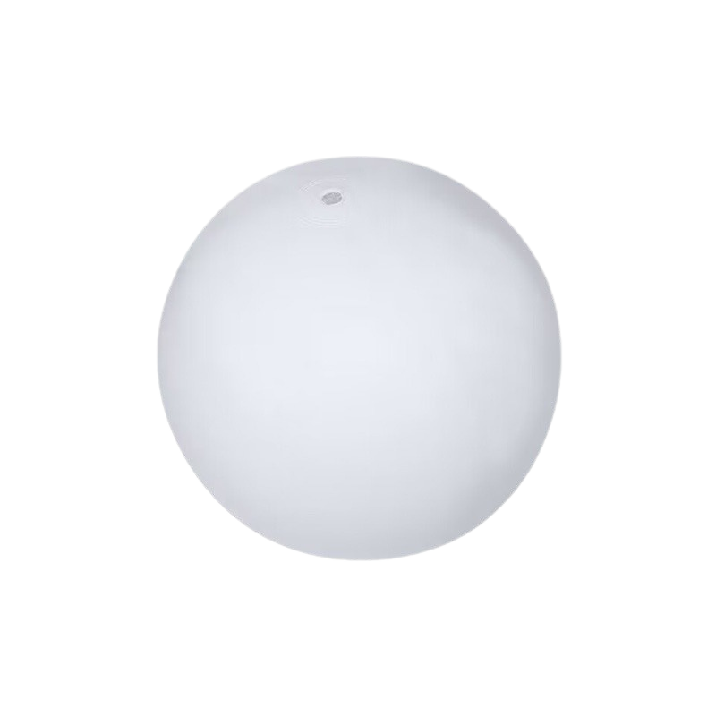 Nighttime scene with a floating LED inflatable beach ball, enchanting pool toy decor