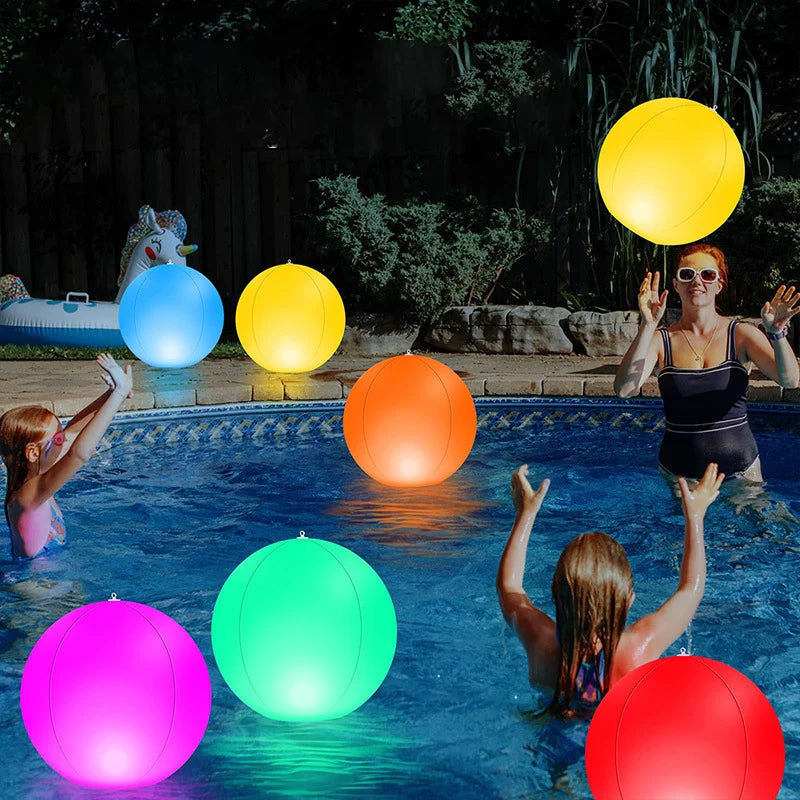 Close-up of the LED light mechanism inside a luminous beach ball, vibrant glow