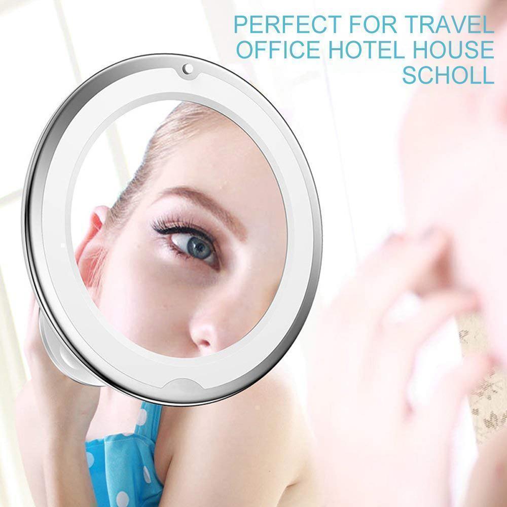 Portable LED makeup mirror featuring 10x magnification and a strong suction cup base