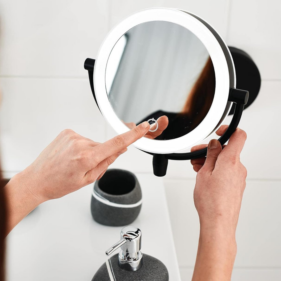 Illuminated makeup vanity mirror featuring 3x magnification and adjustable LED lighting for detailed beauty.