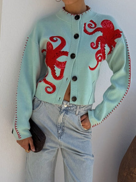 Fashionable light blue knitwear cardigan for women, unique octopus pattern, comfort.