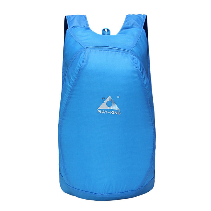 Robust water-resistant 20L hiking backpack, lightweight and foldable for outdoor adventures and travel.