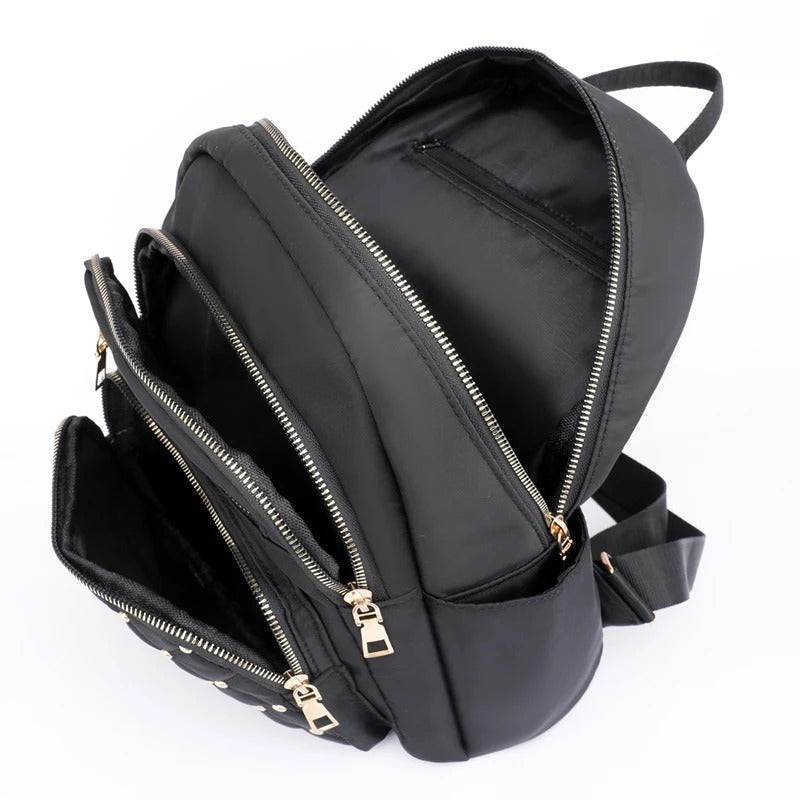 Chic lightweight nylon backpack for women, comfortable for school, travel, or daily commutes, water-resistant.
