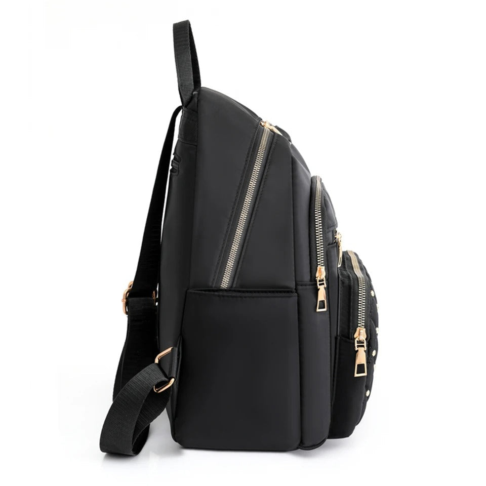 Ultra-lightweight women's nylon backpack, versatile for school, travel, and everyday adventures, water-resistant.