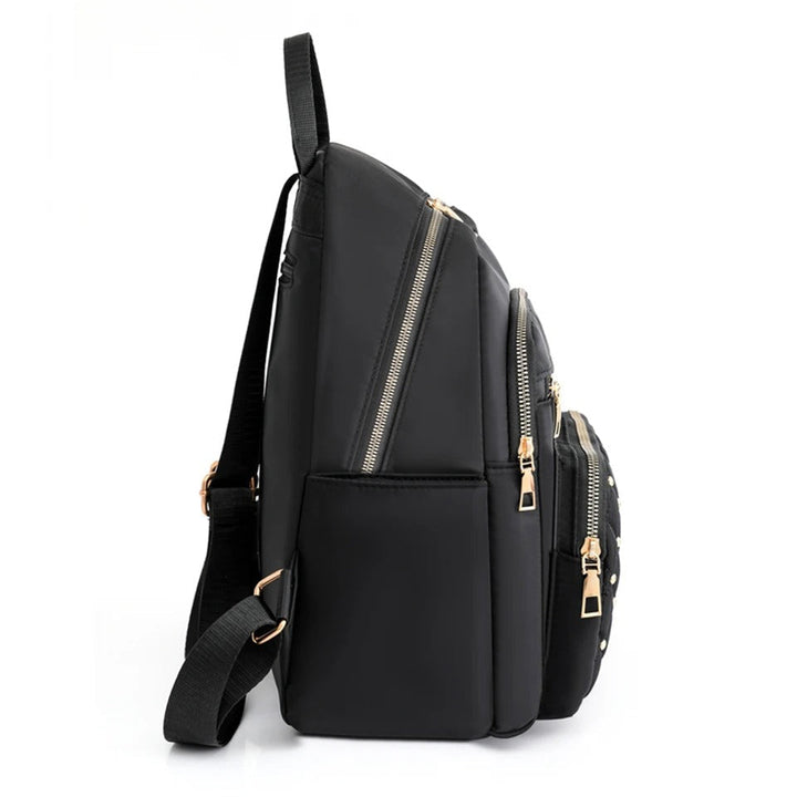 Ultra-lightweight women's nylon backpack, versatile for school, travel, and everyday adventures, water-resistant.