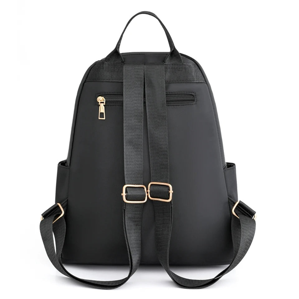 Practical women's travel backpack, lightweight and water-resistant nylon for easy packing & adventures.