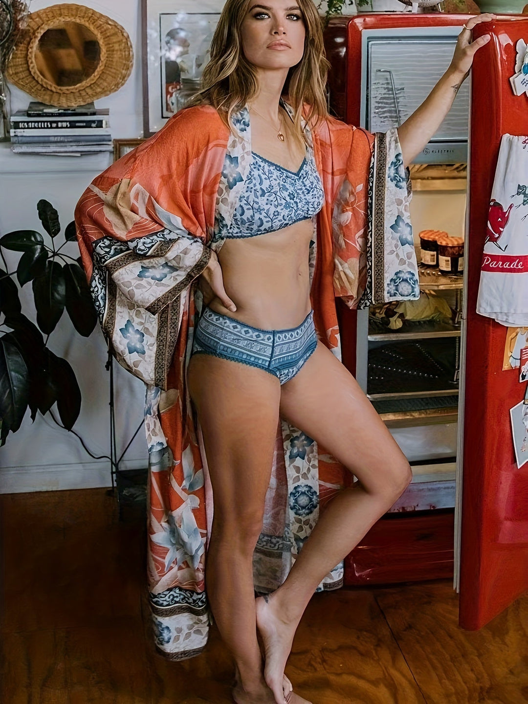 Vibrant floral print women's kimono. Versatile lightweight resort wear, perfect as a beach cover-up.