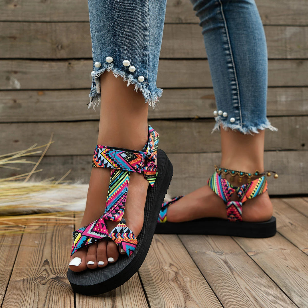 Casual women's summer sandals with a vibrant colorful design. Lightweight & comfortable for beach or vacation.